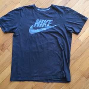 Nike T-shirt with camo logo.